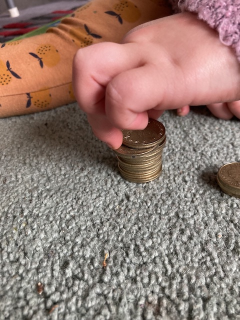 How to introduce money to toddlers with coins